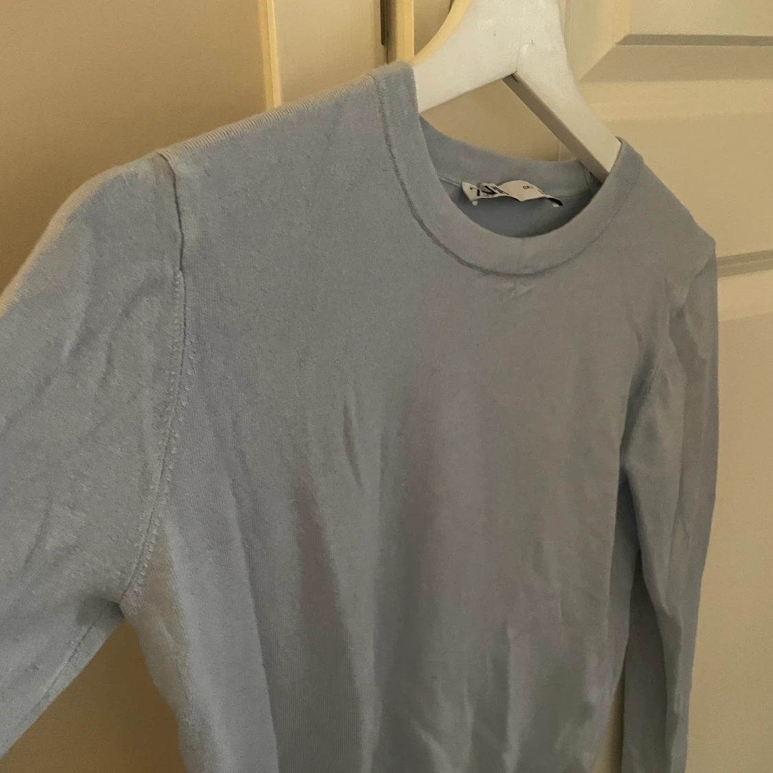 Blå stickad tröja - 91