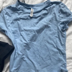 T-shirt - Säljer pga av att jag inte badväder den 