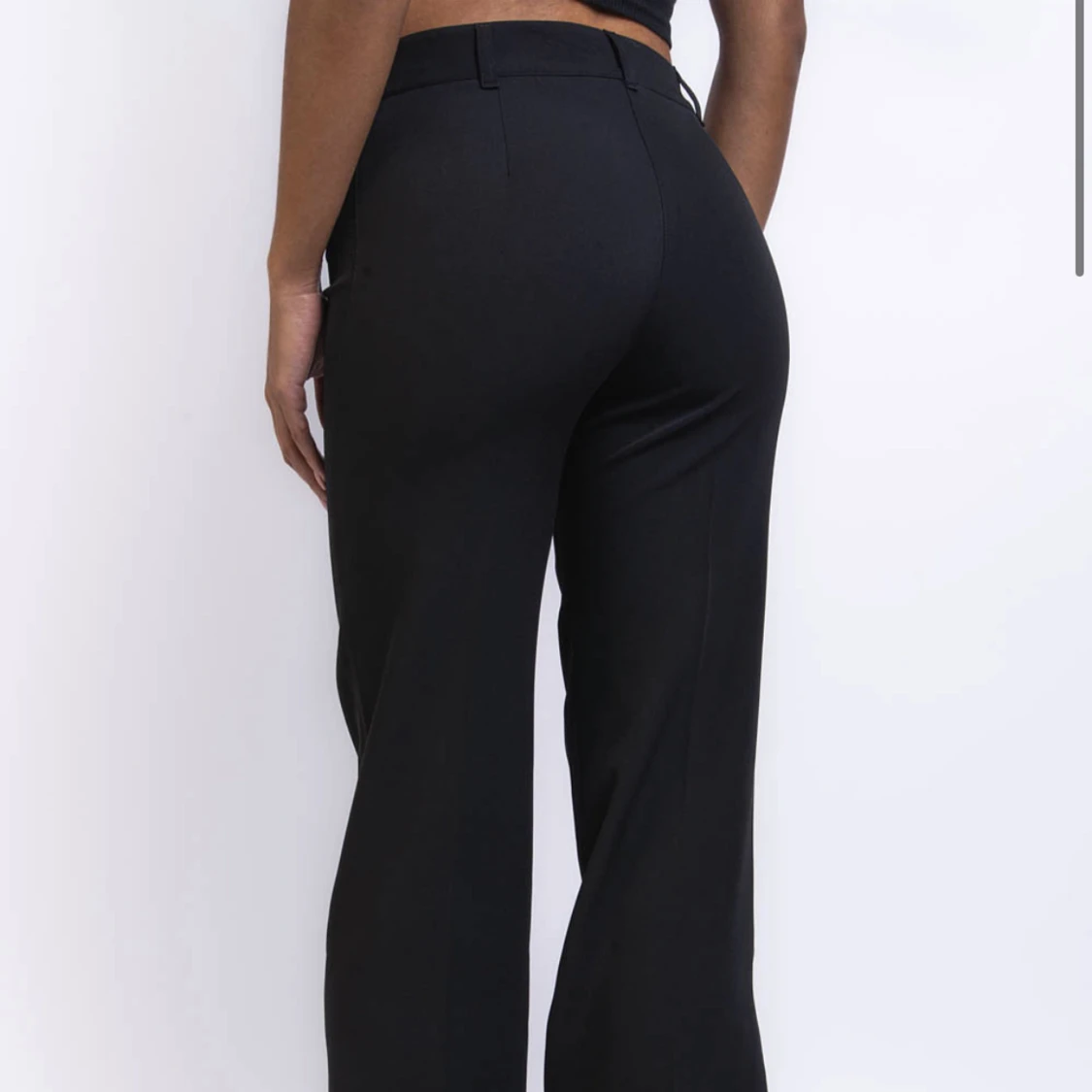 Svarta lågmidjade kostymbyxor  - 91