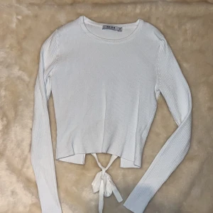 Topp med knut i ryggen - Nyskick! 