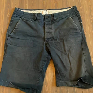 Mörkblå chinosshorts - Mörkblå chinosshorts från Jack and Jones