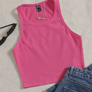 Rosa linne - Säljer ett gulligt rosa linne,sparsamt användt säljs då det aldirg används 