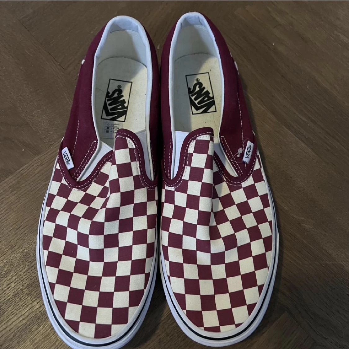 Vans checkerboard slip-ons