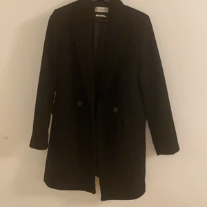 Kappa - Oanvänd kappa från mango 