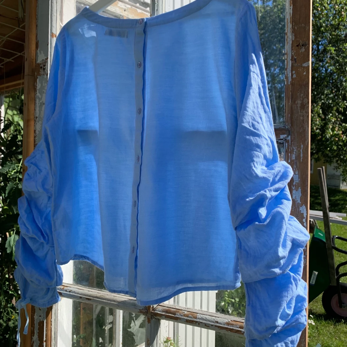 Ljusblå sommarblus - 90