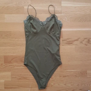 Body med spets  - Aldrig använd. 