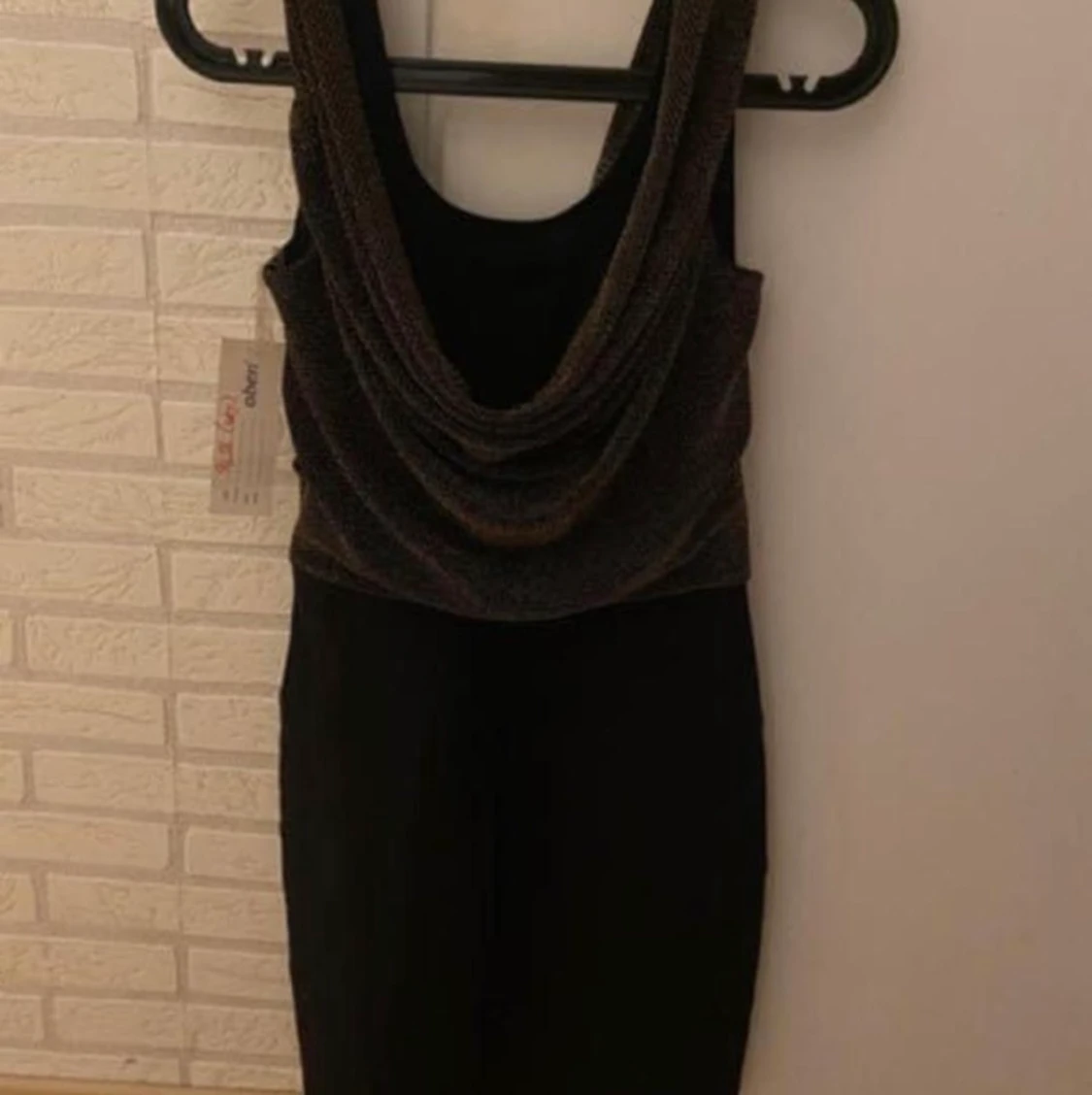 En helt ny klänning i strl S