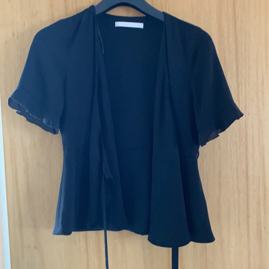 Svart wrap blus från zara strl M