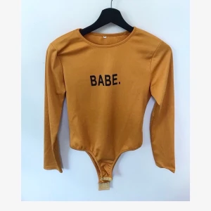Babe. Body Shirt - Used. Still looking like a snack, size is M and I’m size S so that’s why it looks bigger on me. Some signs of use can be visible. 