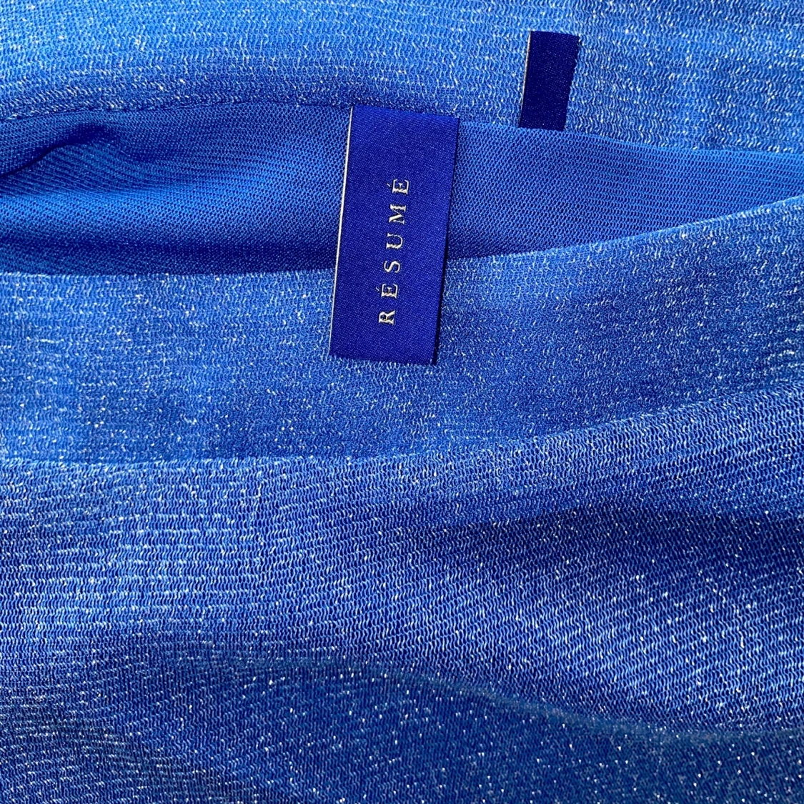 Resumé – Ninnet – Glittrig kjol med volangkant - 91