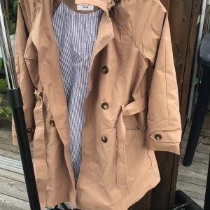 Jacka  - Den jacka är helt oanvänd. 