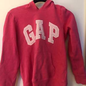 En rosa GAP hoodie i kids storlek 160. 