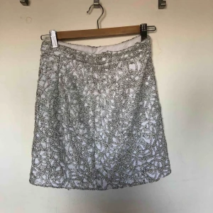  - Glittrig kjol från river island.   Nypris: 499:- 