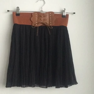  - Fin kjol med volanger