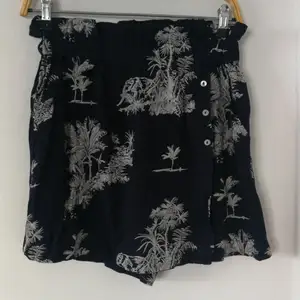 Navy colour with pattern shorts/skirt from Mango 