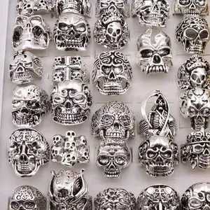 Silver skull rings in different sizes. 