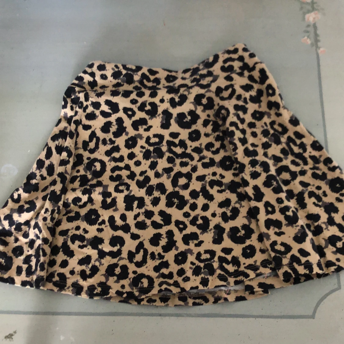 Leopard skirt.