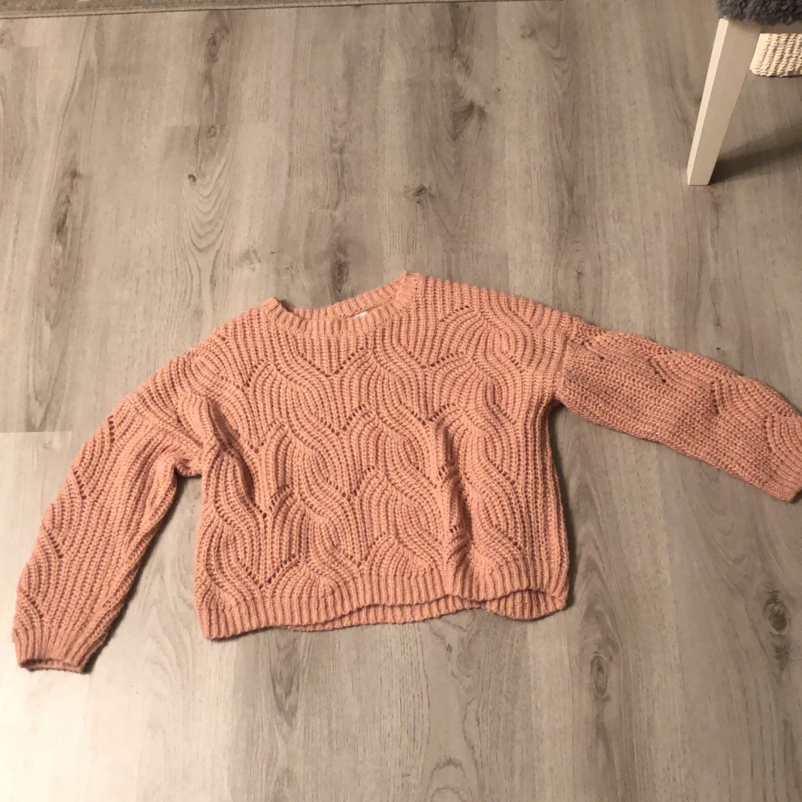 Fin oversized stickad rosa tröja.