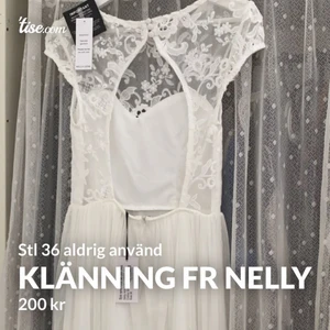 Vit klänning öppen rygg - Vit klänning med öppen rygg från Nelly, prislapp kvar, aldrig använd