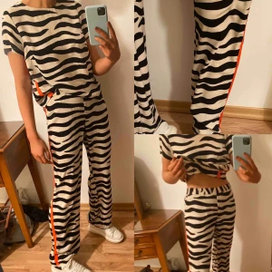  - Byxa och tröja från Lindex. Båda i strl S, jag är 175cm lång.