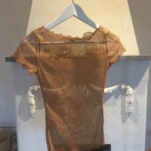  - Mesh glitter topp, använd en gång. Köparen betalar frakten :)