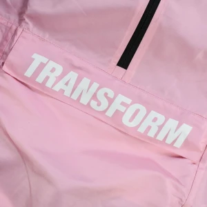Snowboard Anorak/windbreaker  - Transform Snowboard Anorak (brand new) from last season. Size M (unisex), pink. Baggy fit, water resistant (10k). 