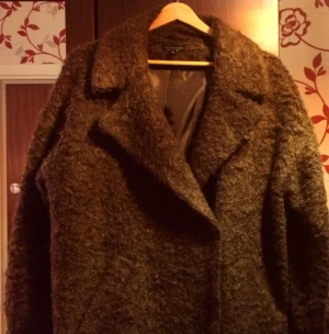 Nice coat bought this year at Top Shop in Gothenburg. Cosy and very comfortable coat.  - Nice coat bought this year at Top Shop in Gothenburg. Cosy and very comfortable coat. 