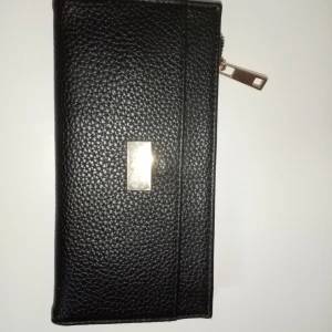 Åhléns plånbok  - Bra skick finns i Huddinge 🙂