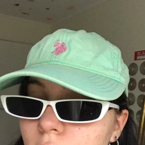 us polo keps - turkos och rosa keps!! skiitsnygg och i fint skick ;b 