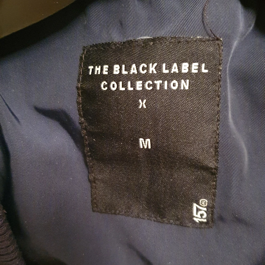 Mörkblå bomberjacka strl M - 91