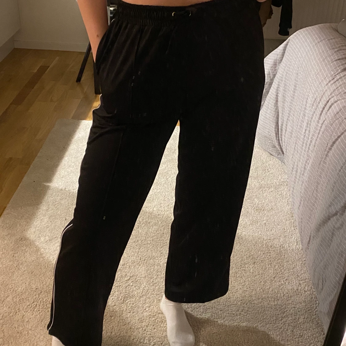 svarta tracksuitbyxor - 90