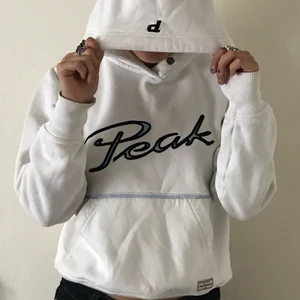 Peak performance  - Vit peak performance hoodie med 05 på baksidan