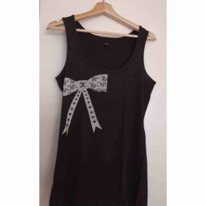  - Mörk brun linne (barn storlek L)