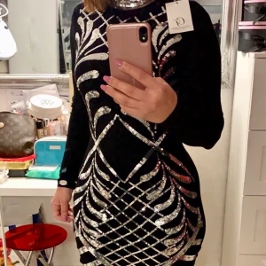 Klänning  - Svarta klänning med lappen 