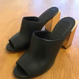 Brand New Topshop black leather mules with brushed matt gold block heel- size 38 :) Perfect condition but no box 