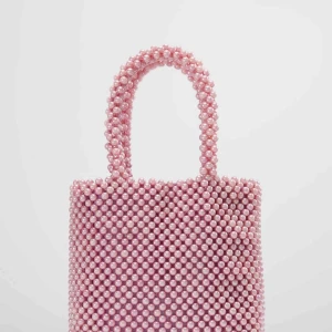  - Helt ny pärlväska, alla etiketter sitter fortfarande kvar. Kan skickas mot fraktkostnad