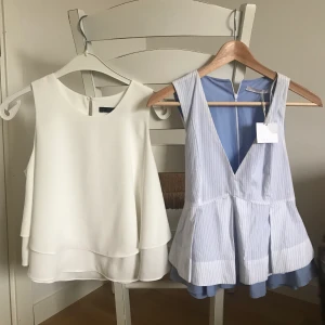 Tröjor från Zara - Två tröjor från Zara. Ena är oanvänd med lapp kvar och en som är använd ett fåtal gånger. Storlek XS i den vita och S i blåa. 100kr för båda två
