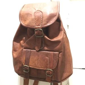  - Skinnryggsäck i mycket gott skick. Aldrig använd! 