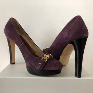 Purple MK high heels, great for your fancy night out