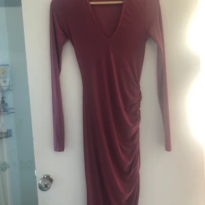 Klänning Rebecca Stella  - Fin klänning från Rebecka Stella har aldrig kommit till användning 