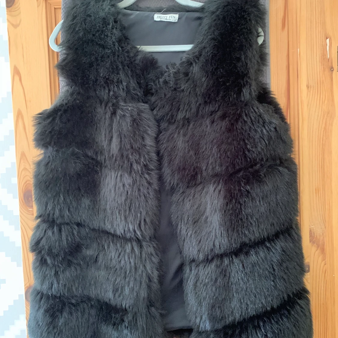 Pälsväst, storlek L/XL 
