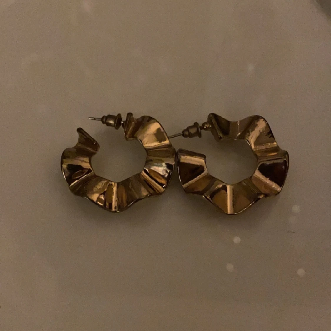 Guldiga örhängen  - 91