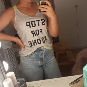 Träningslinne - Grått träningslinne. Skönt och luftigt.