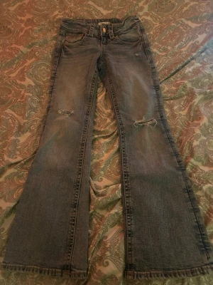 Bootcut jeans - Ljusblå jeans från gina tricot