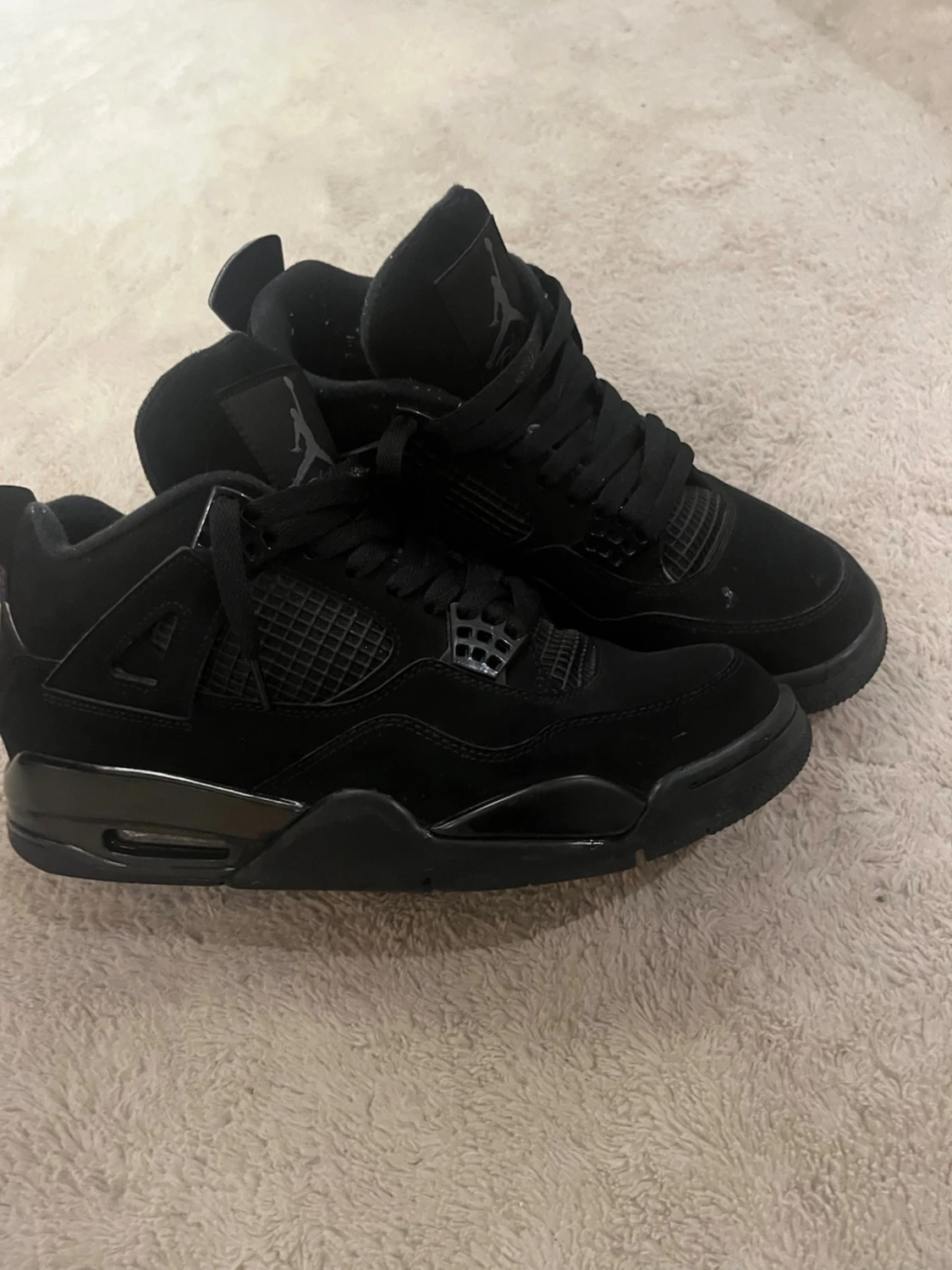 Svarta Nike Jordan 4 sneakers - 1