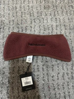 fleecepannband Peak Performance - Ny 