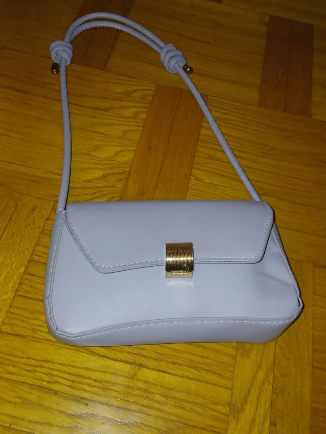 Grå/blå axelväska med gulddetalj