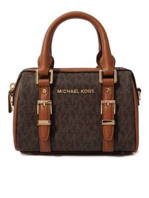 Brun handväska från Michael Kors - Säljer en snygg handväska från Michael Kors i brunt. Modellen säljs inte i Sverige. Fick den när jag var i London. Ursprungligt pris var 7000kr. Inga defekter, bara använd några gånger.