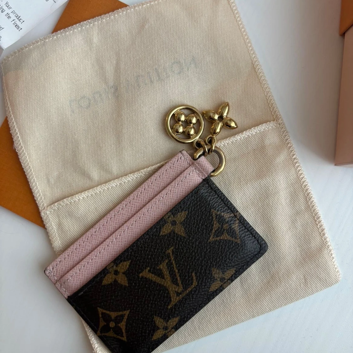 Louis Vuitton plånbok i rosa och brunt