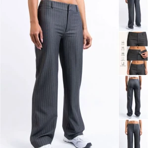 Kostymbyxor  - Gråa kostymbyxor från madlady i storlek 34, lågmidjade/midwaist